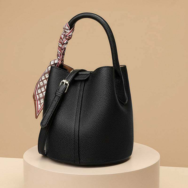 0225新女款包小众设计荔枝纹高级桶质感软皮单肩手提包大容量水包