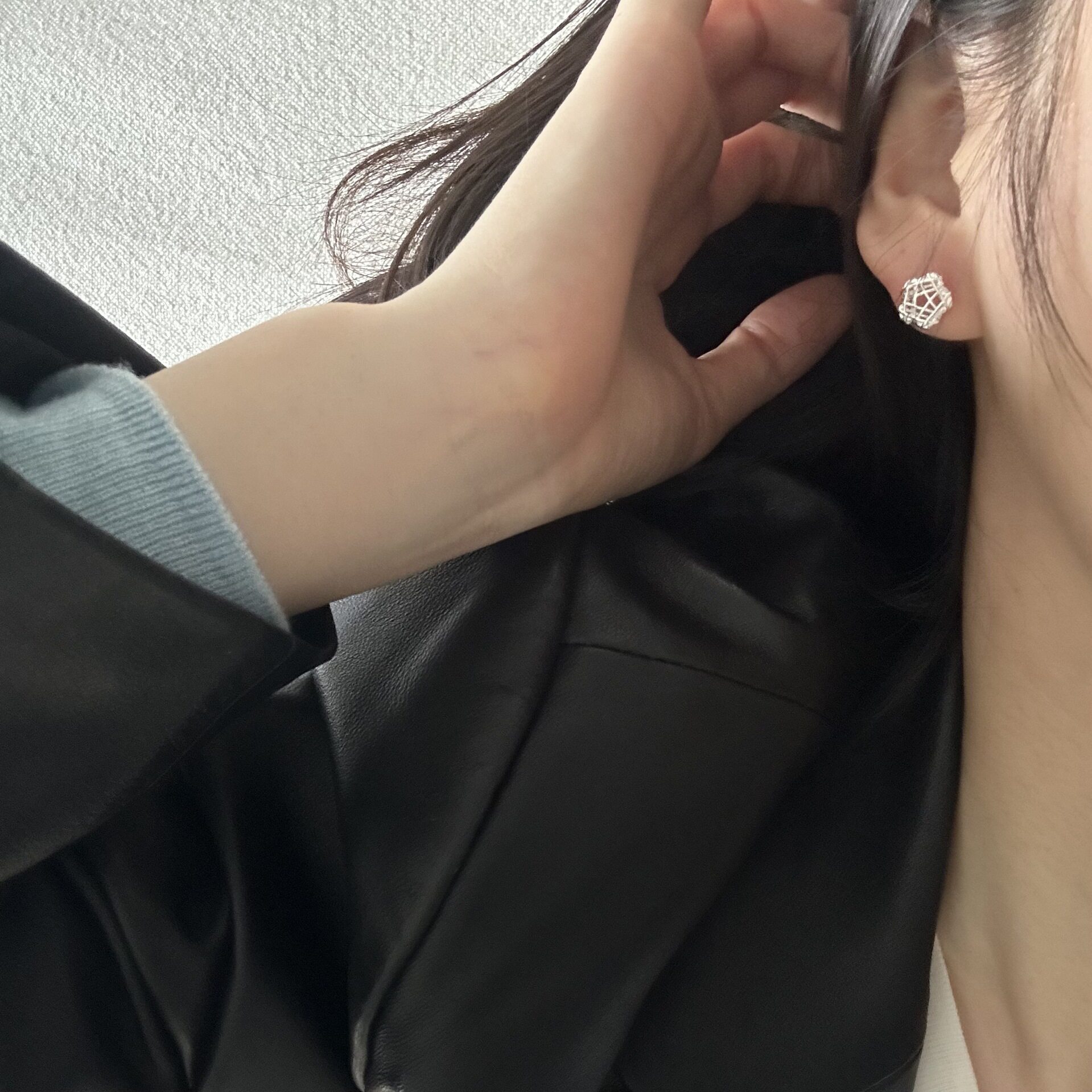 999足银不对称绕丝五角星锆石耳