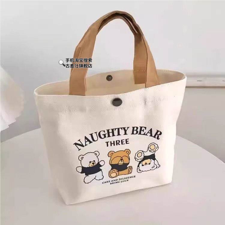 包包女新款日韩版小清新化妆包收纳袋便当包百搭女生手提袋帆布包