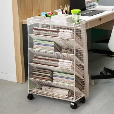 Small bookshelf next to the desk side gap book storage shelf