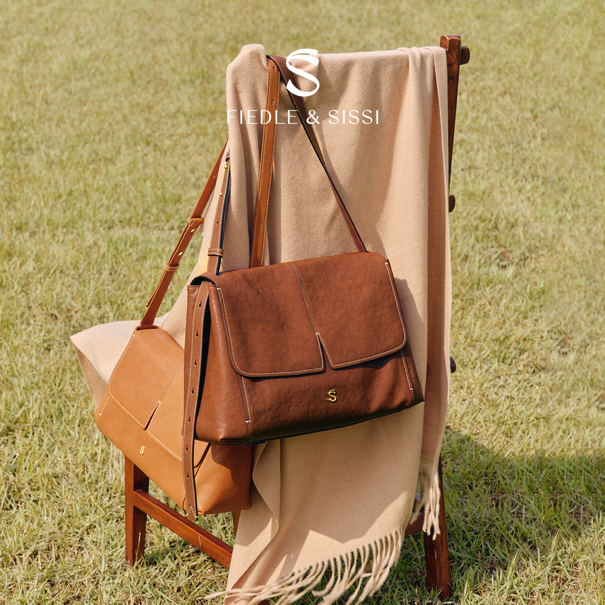 fiedlesissi/菲德茜茜飞鸟邮差包女大容量通勤旅行斜挎单肩包