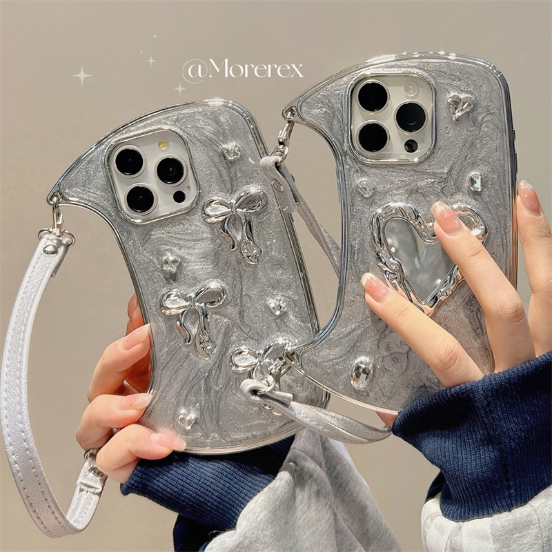 ins冷淡轻奢高级感爱心蝴蝶结手提包适用苹果16手机壳挂绳iphone13promax新款14女15硅胶12防摔全包11保护套