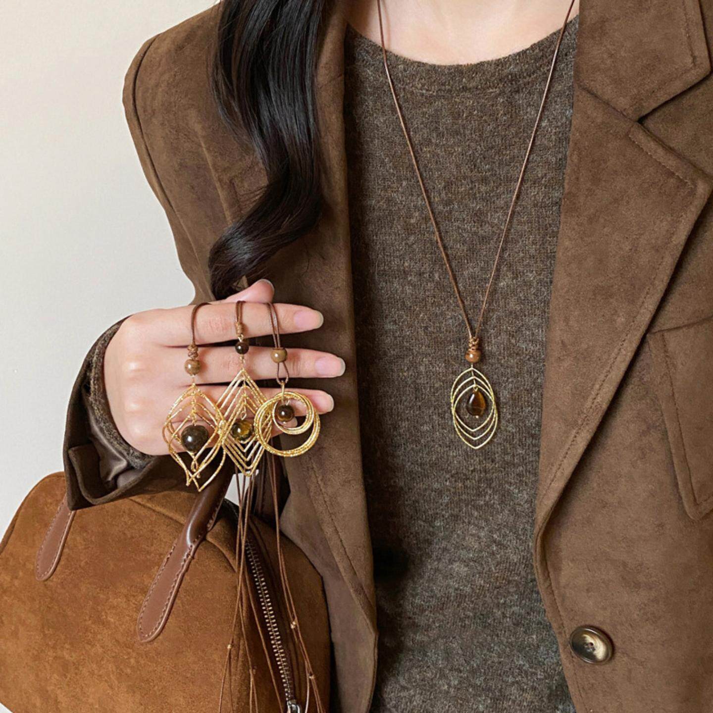 超闪金色虎眼石吊坠项链女轻奢高级感秋冬复古毛衣链百搭长款配饰