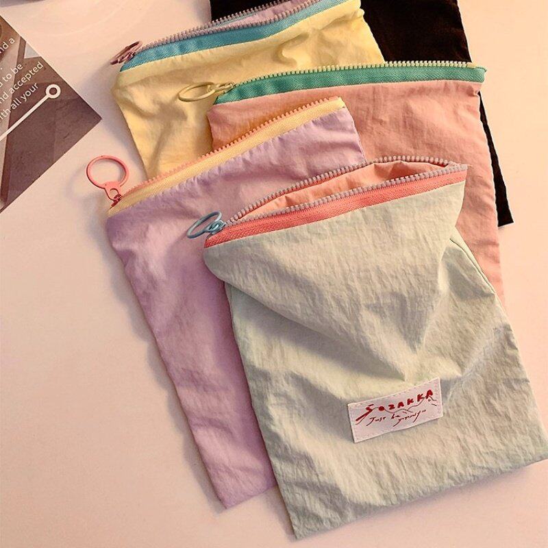 马卡龙收纳包韩版ins风撞色薄款零钱包外出便携撞色化妆收纳袋子