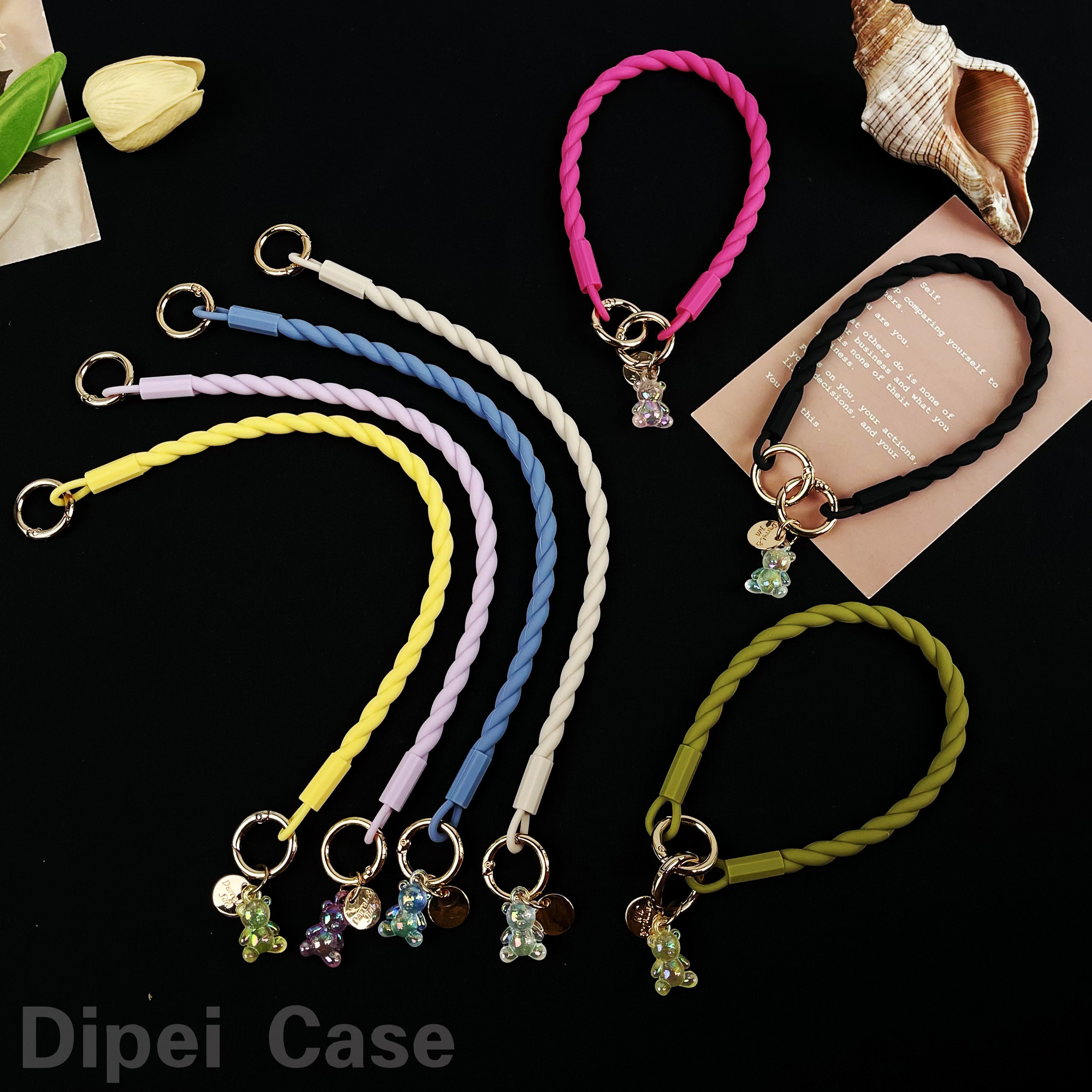 日韩纯色麻花硅胶手机挂链激光小熊挂饰可手提手腕可挂户外旅游解放双