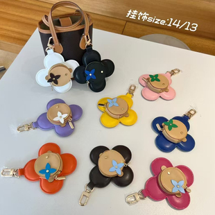 2025新款太阳花钥匙扣硬币包女士小众真皮包包挂饰百搭耳机粉饼包