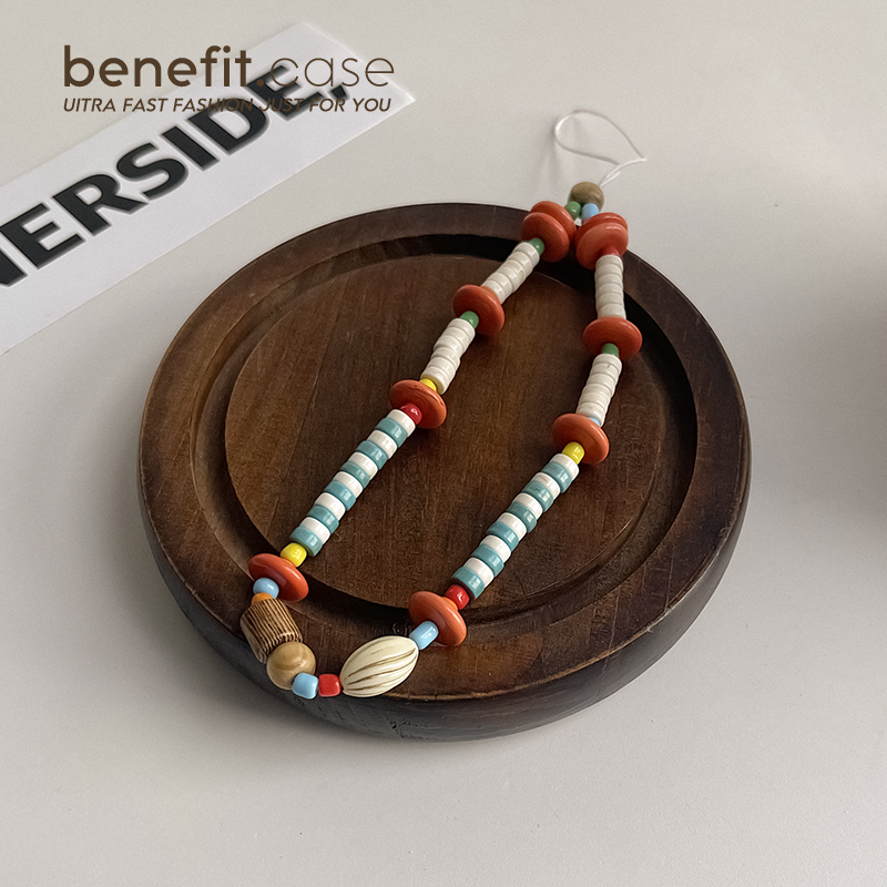 benefit橙白串珠手机壳手链