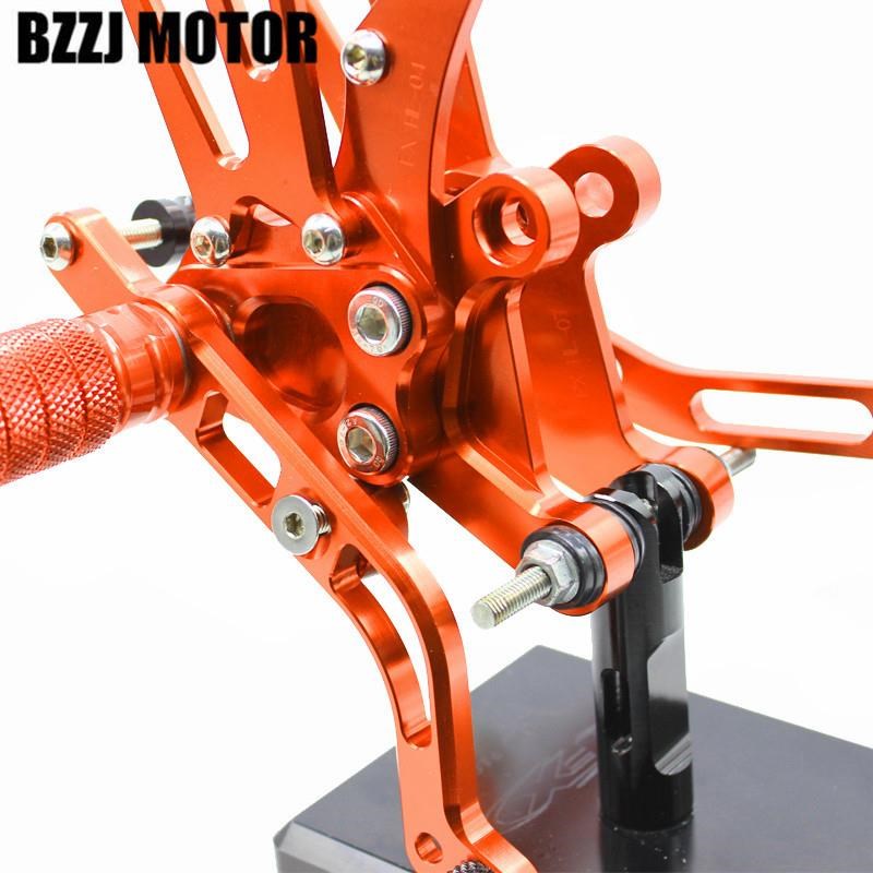 适用贝纳利黄龙gBJ600TNTBN赛600改装支架刹车加高升高脚踏板总成