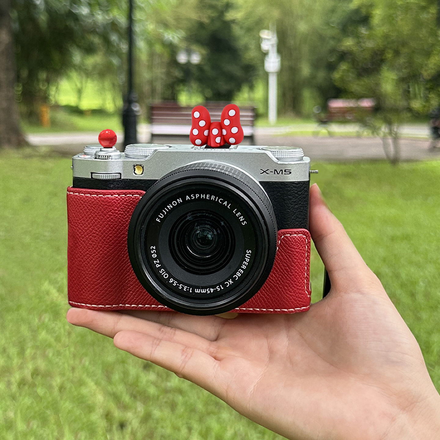 适用富士XM5保护套X-M5相机包xm5半包皮套底座壳配件便携摄影包