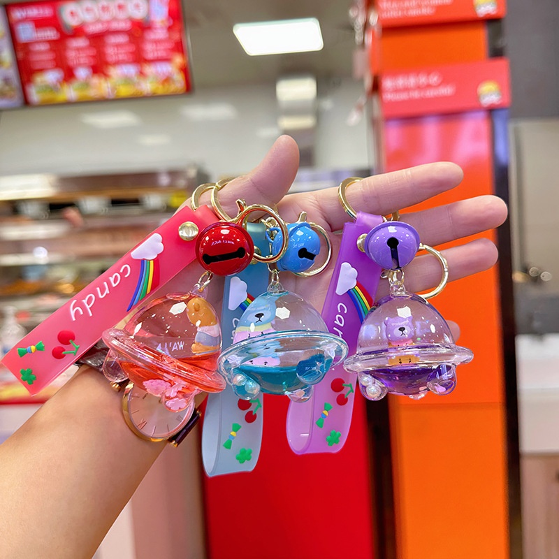 创意流沙宇宙飞船钥匙扣 个性潮流PVC软胶手绳小铃铛时尚背包挂饰