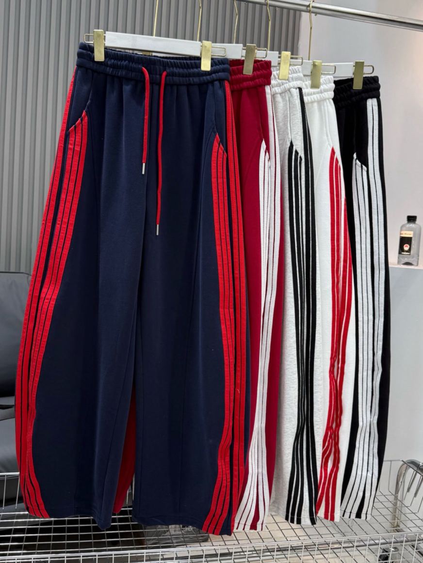 欧货2025秋季新款显瘦百搭抽绳松紧腰侧条纹织带弯刀休闲卫裤女潮