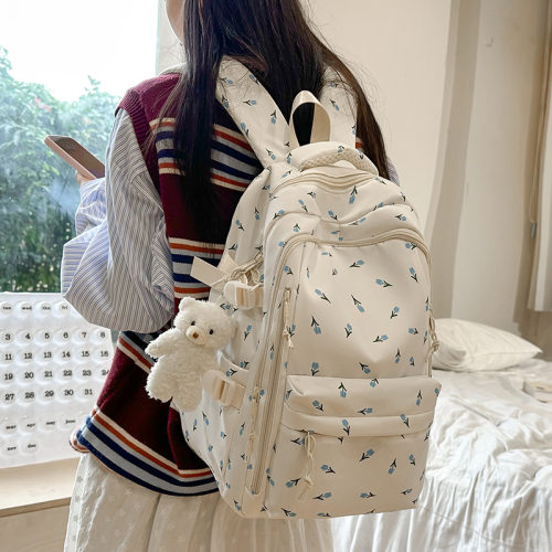 简约大容量印花双肩包女生轻便休闲背包初中生中学生书包百搭