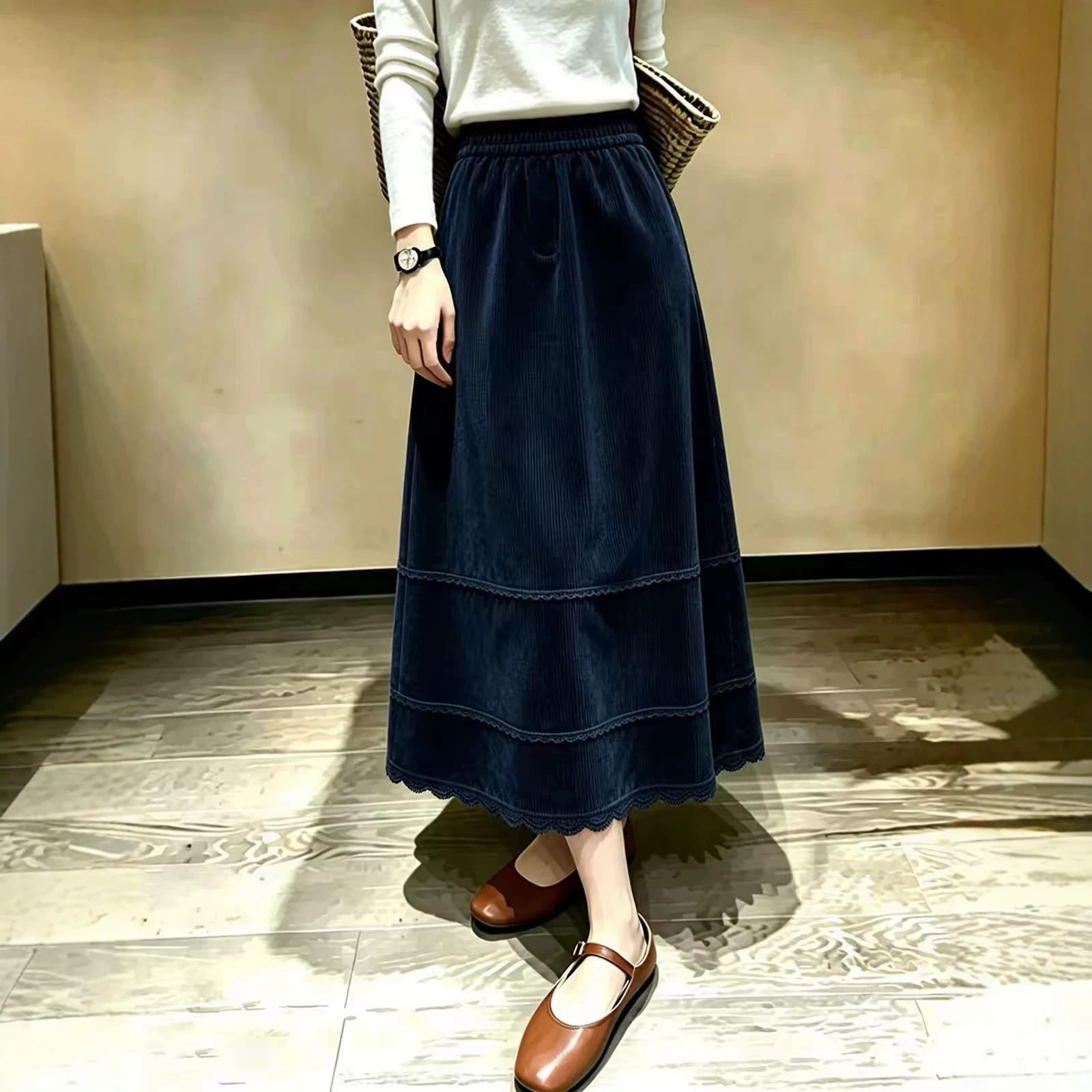 中裙色花边下摆灯芯绒裙女2026早秋新款显瘦百搭时尚a字裙半身裙