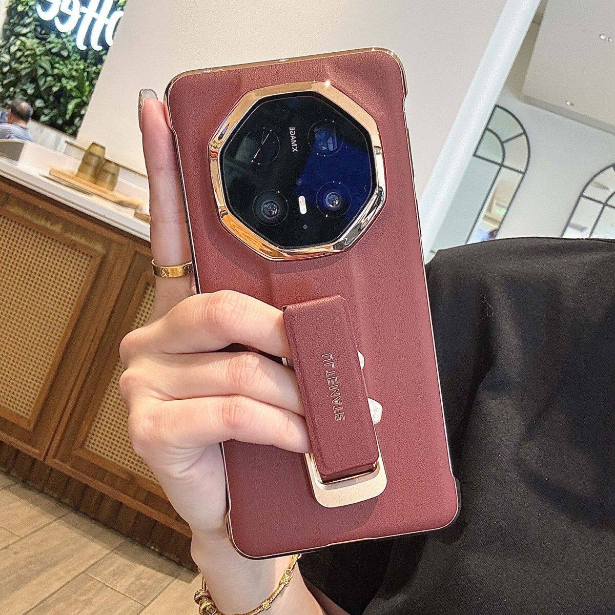 适用于华为mate70rs非凡大师手机壳新款腕带支架红色新年款超薄无边框60rs半包防摔保护套80rs高档真皮外壳