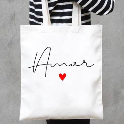 字母情侣帆布包通勤女单肩文艺简约青年学生小清新韩版日系帆布袋