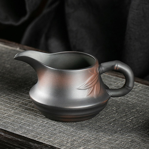 瓷绕九仙紫陶茶具公道杯