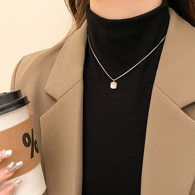 古婷金色贝壳毛衣链女款轻奢小众高级感装饰项链2026年新款锁骨链