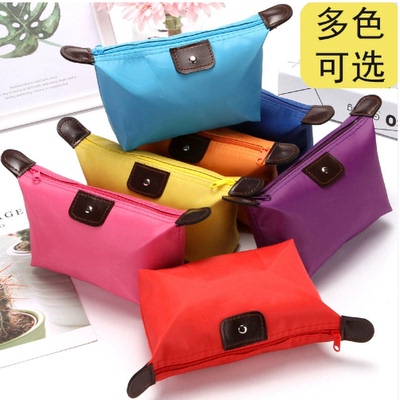 手拿包大容量高级感糖化妆收纳包旅行便携女夏季小包饺子包