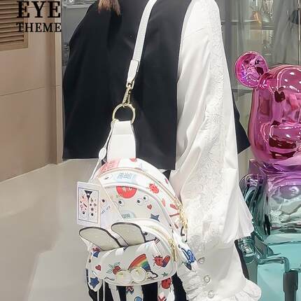 EYE THEME多用途女士设计感粉色双肩背包迷你可爱印花胸包百变