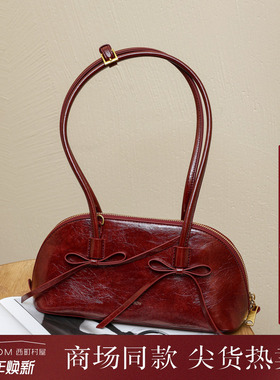 西町村屋气质感手提包女秋冬新款小众蝴蝶结设计贝壳包XAAD60031