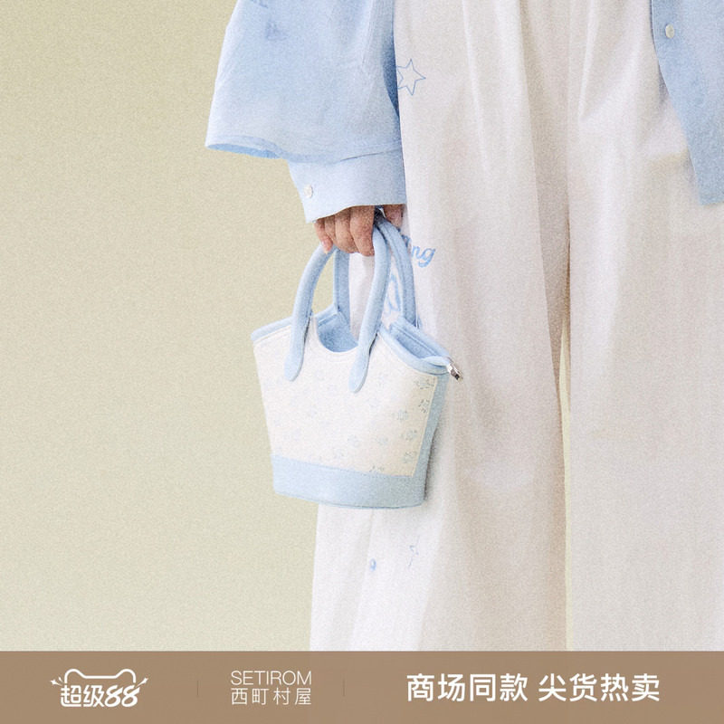 西町村屋简约清新碎花手提包新款女简约百搭可调节背带XABB60021