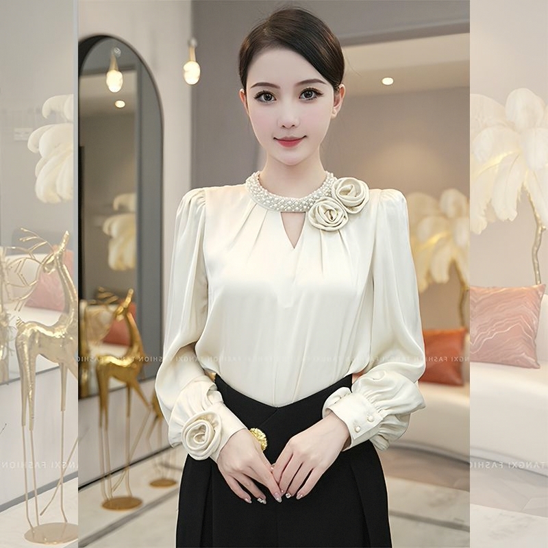 春秋装女款2025年新款高级感上衣气质奶白色衬衫女小众设计感百搭