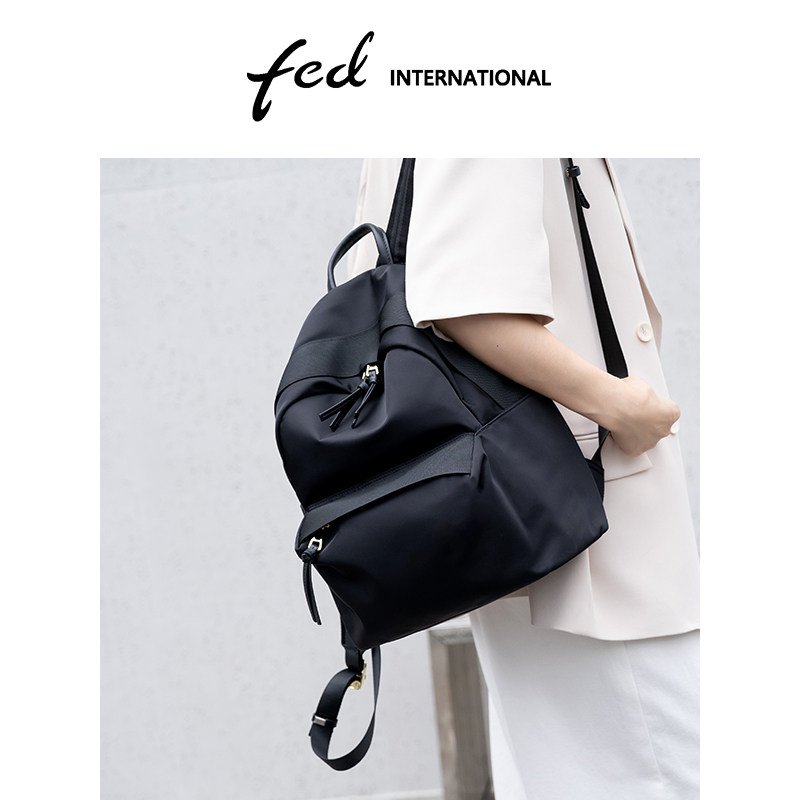 fed极简风双肩包女通勤轻便大容量商务真皮背包黑色书包BFA9860