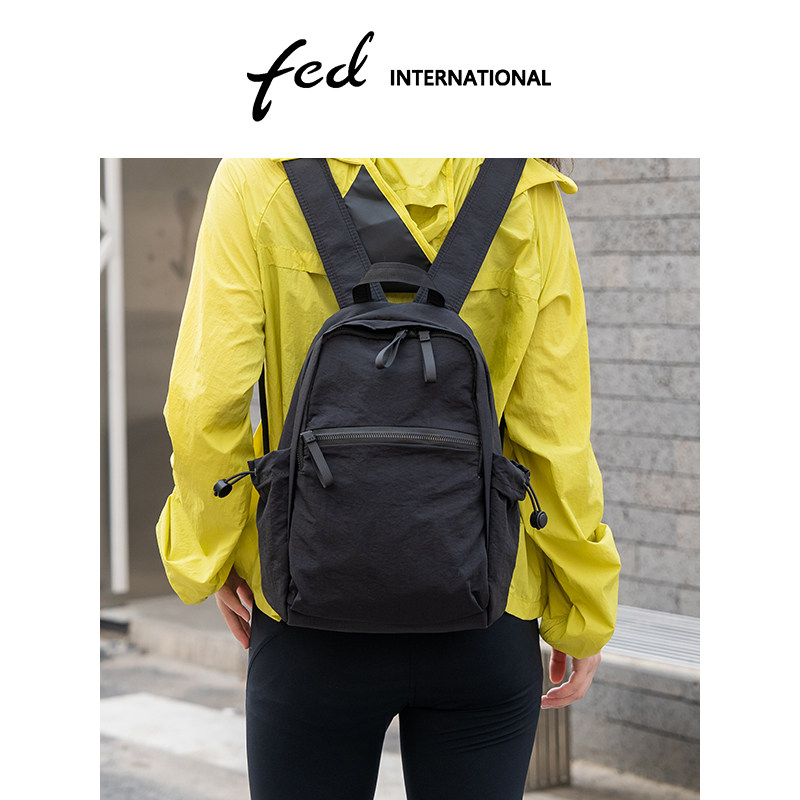 fed休闲风黑色/拼色双肩包男女轻便百搭旅行背包手提包BFA7029