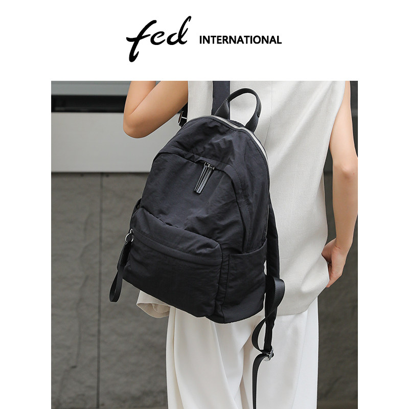 fed简约风黑色双肩包女大容量轻便旅行背包休闲出游书包BFA7017