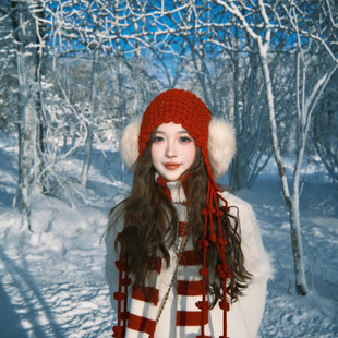 红色毛线针织帽子女川西东北新疆雪地旅游可爱冷帽网帽流苏包头帽