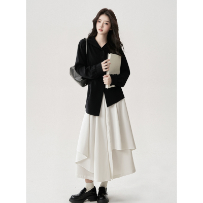 秋冬季不规则设计感白色半身裙女高腰显瘦遮胯防走光A字裤裙