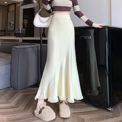 秋季高腰显瘦a字毛线裙垂感包臀大摆鱼尾裙杏色流苏针织半身裙女