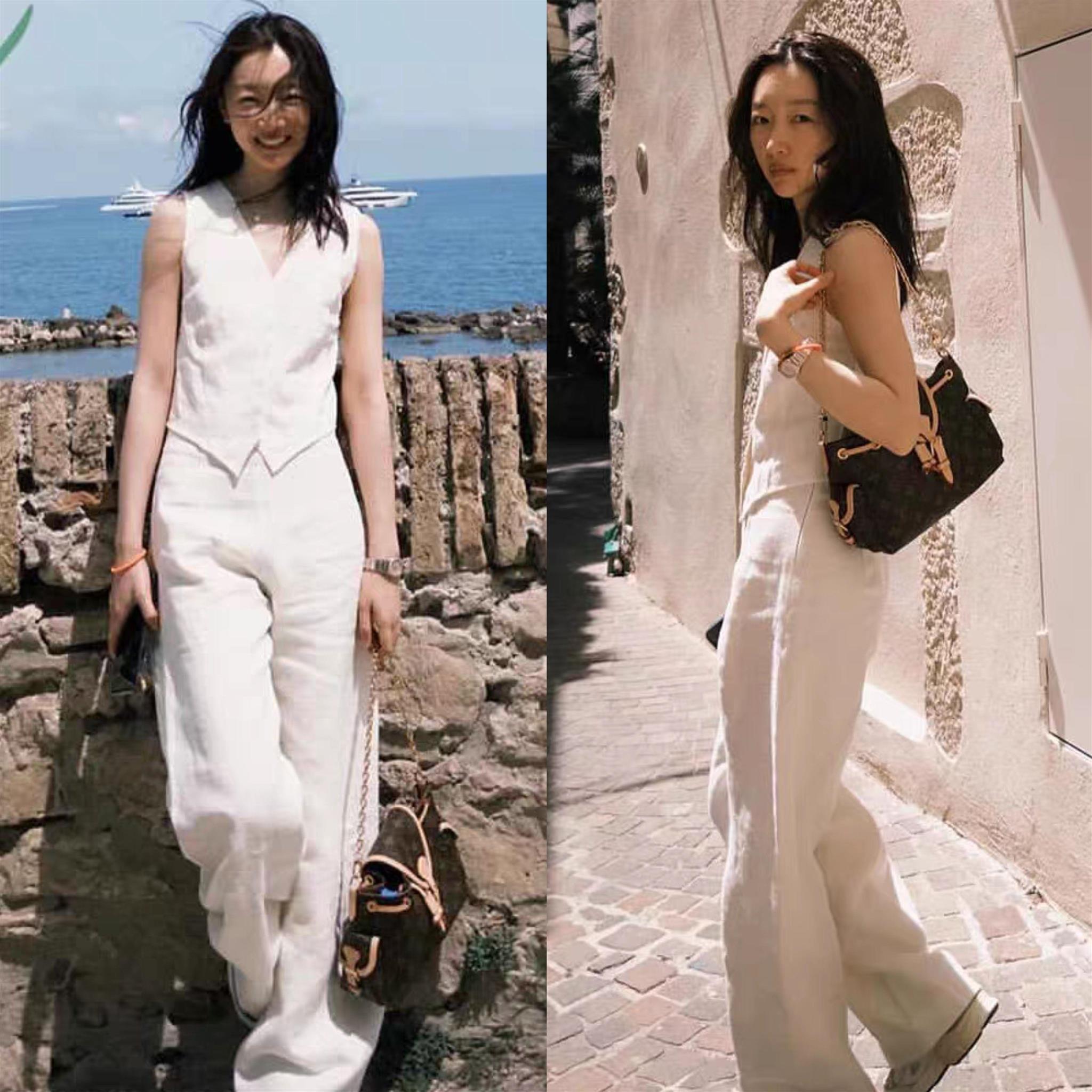 欧美周冬雨同款白色两件套V领无袖马甲上衣女高腰阔腿裤时尚套装
