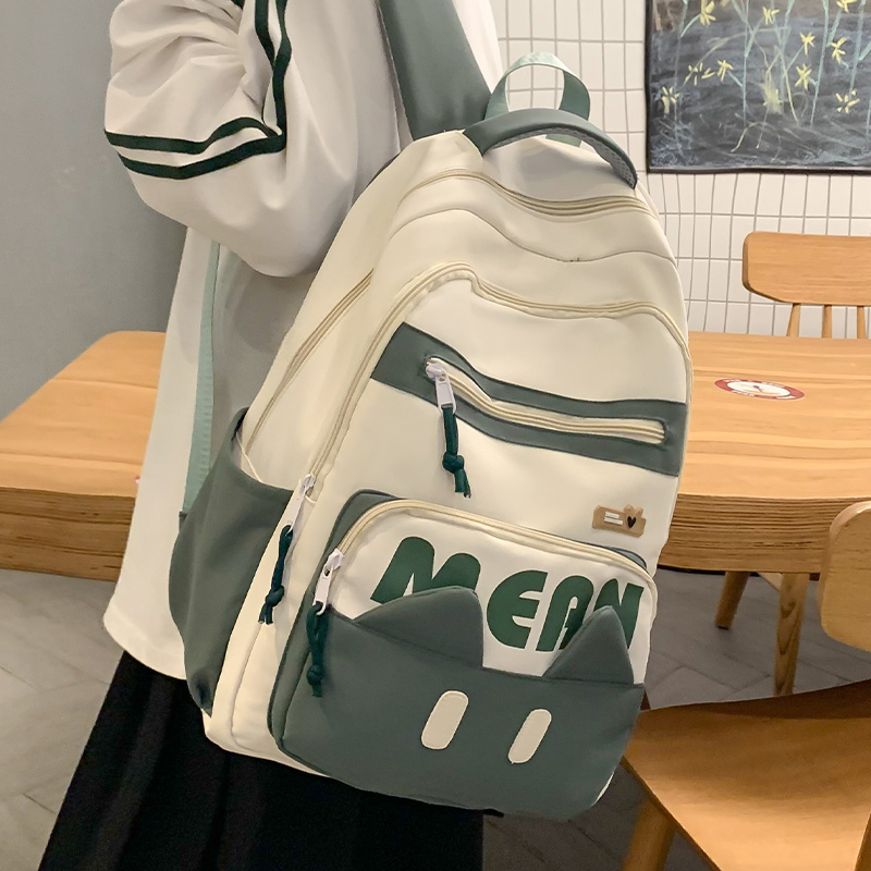 书包初中女生男小学生高中生背包