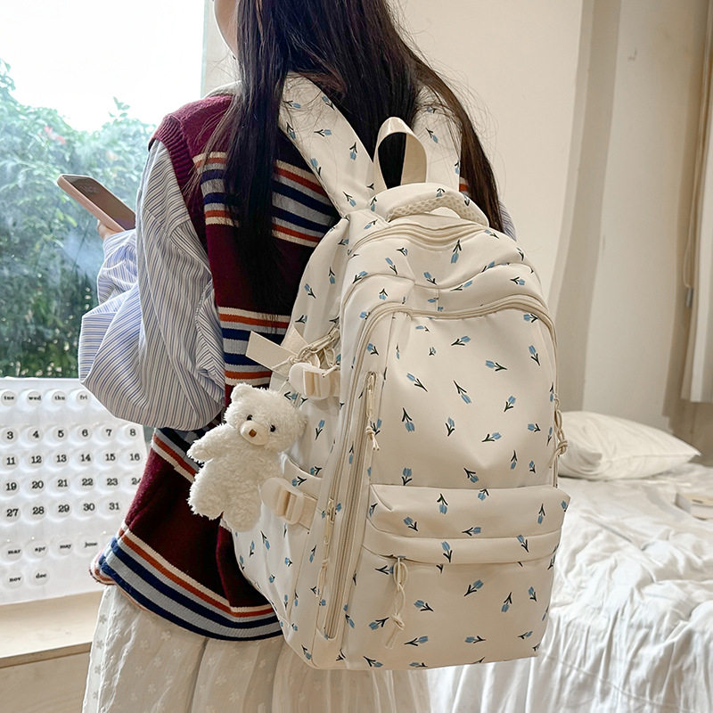 简约大容量印花双肩包女生轻便休闲背包初中生中学生书包百搭