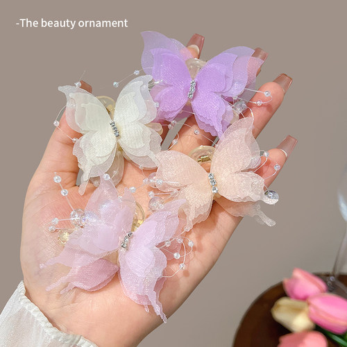 森系珠珠纺纱蝴蝶小抓夹女