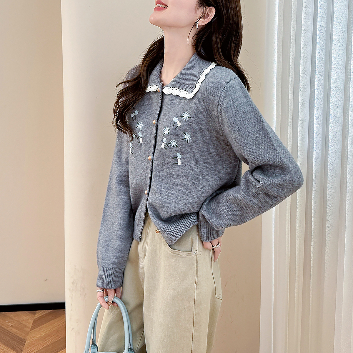 唐狮秋冬季女毛衣绣花设计翻领开