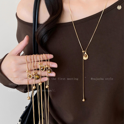 复古美拉德虎眼石抽拉毛衣链