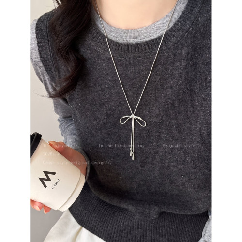 韩系甜美蝴蝶结抽拉项链女小众设计感长款毛衣链高级感百搭配饰品