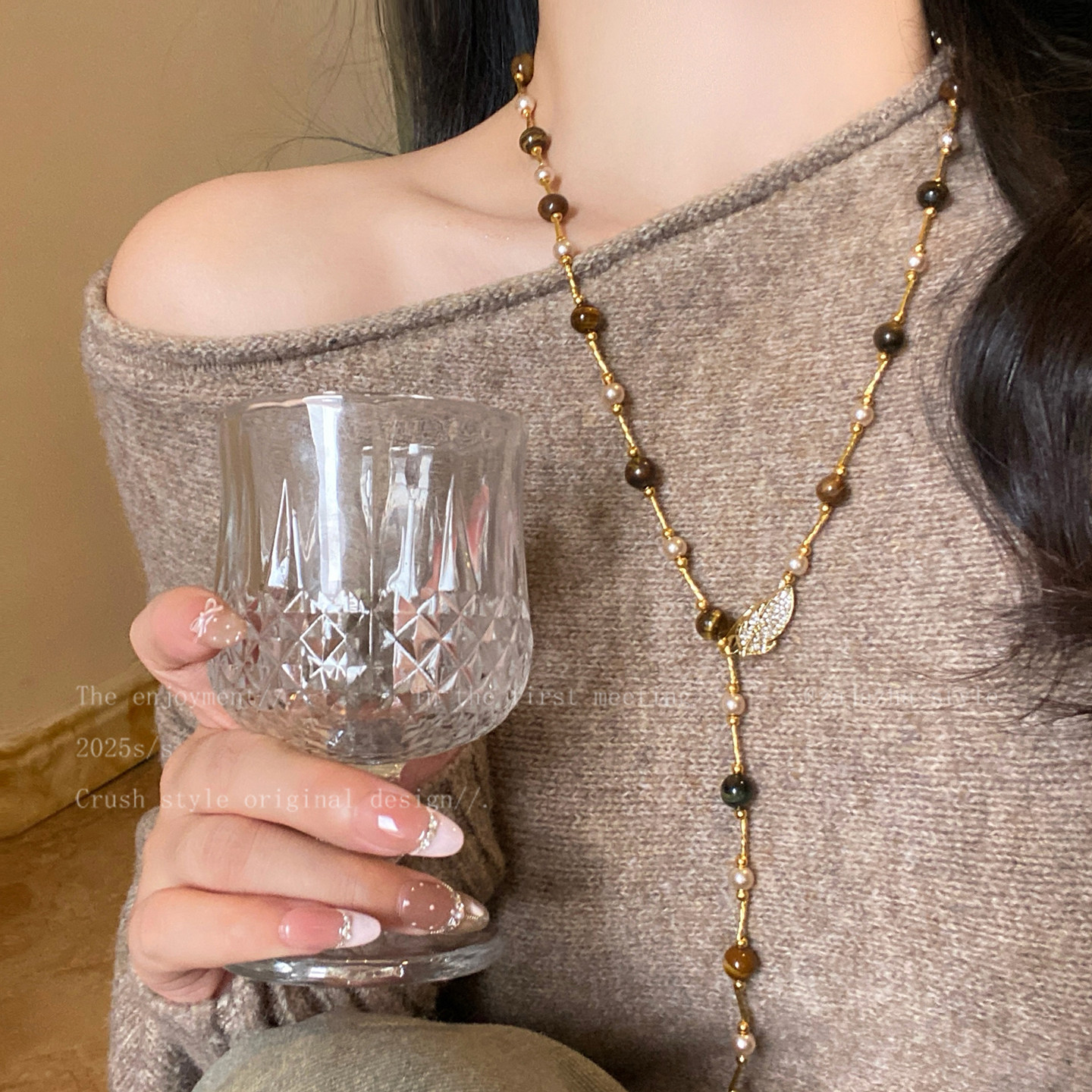 美拉德虎眼石毛衣链女秋冬2026新款长款小众轻奢高级感项链配饰品