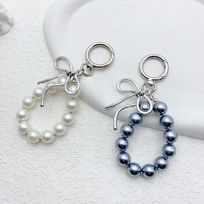 韩国nyunyu时尚金属蝴蝶结仿设计感手机包挂件车钥匙扣ins感