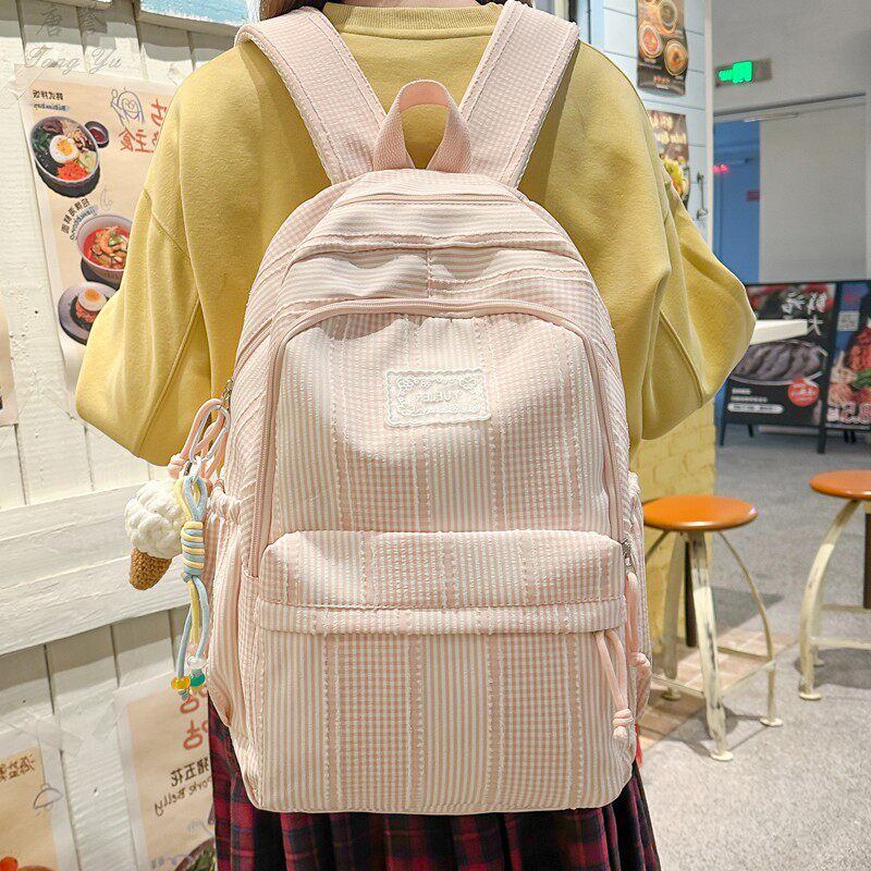 书包女初中生高中生ins条纹双肩包大学生高颜值小众简约轻便背包