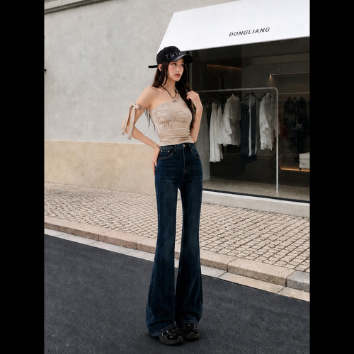 拉夏贝尔深蓝色微喇牛仔裤女2026