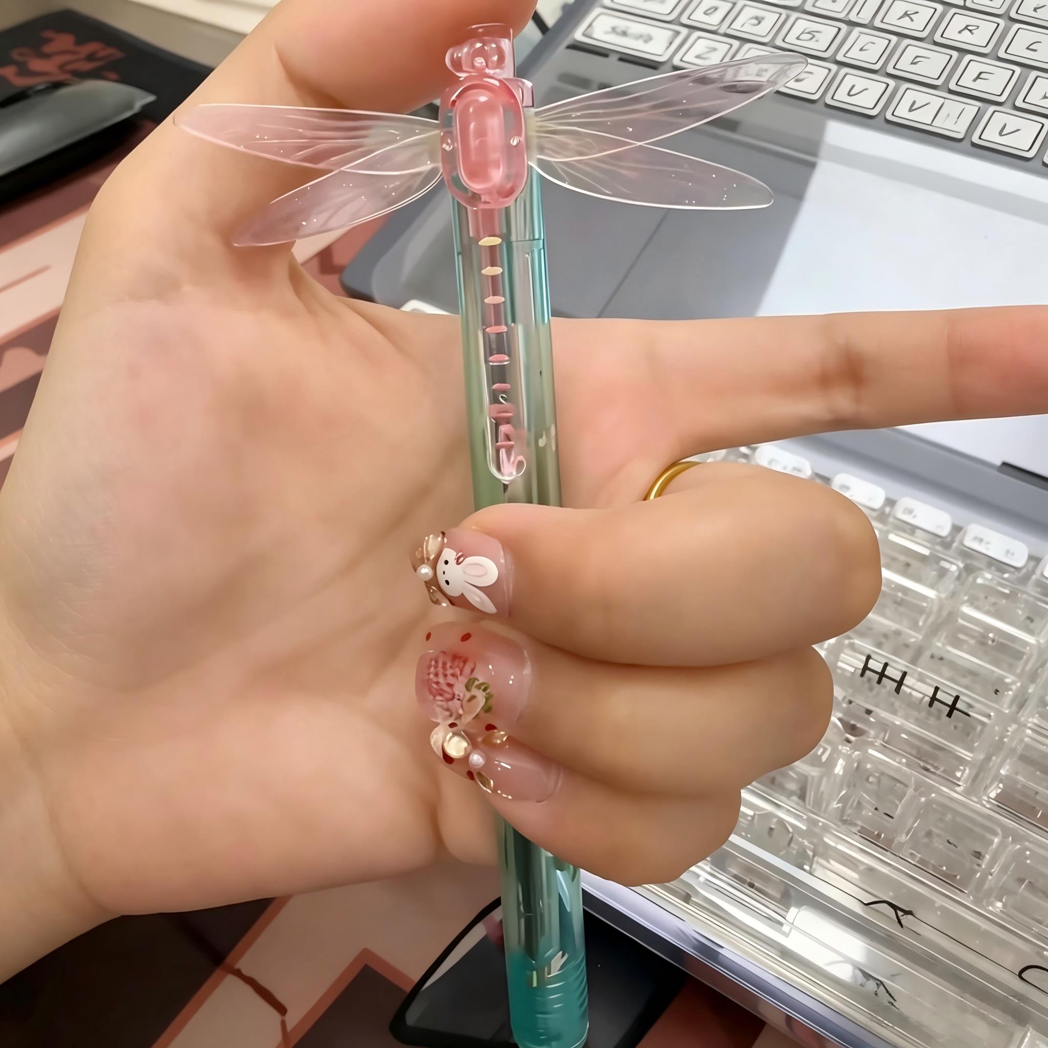 蜻蜓中性笔按动振翅流光圆珠笔学生专用刷题笔卡通解压上课可玩笔