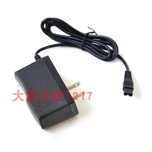 侣字 689 翰光 数码强光多功能LED探照灯 800A充电器 双插孔 扁插怎么看?