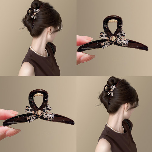 高智感豹纹~复古闪亮蝴蝶结抓夹