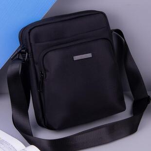 男斜挎包竖款单肩包男士通勤帆布小包男款高级感大容量休闲男背包