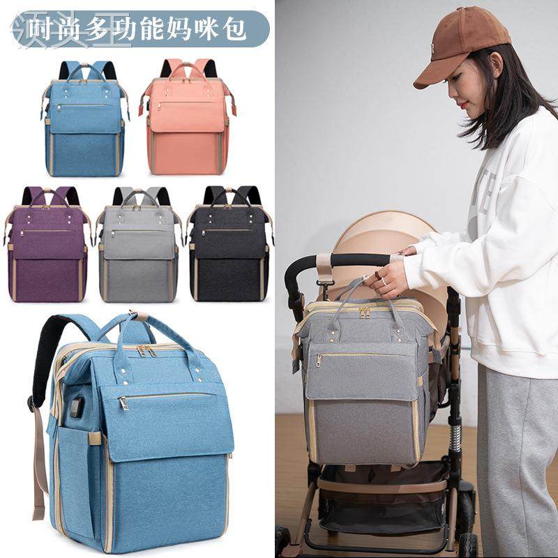 新款多功能便携折叠前置宝宝座婴儿床妈咪包大容量干湿分离双肩包