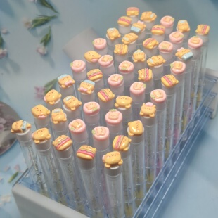 黄油小熊嫁接假睫毛刷独立试管装一次性便携睫毛梳化妆刷带透明管