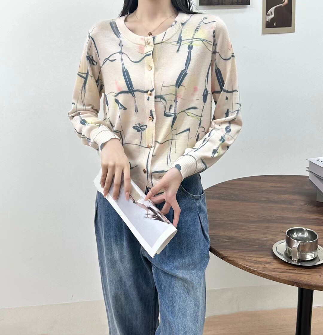 特价春款女士天丝羊毛印花圆领开衫长袖针织衫
